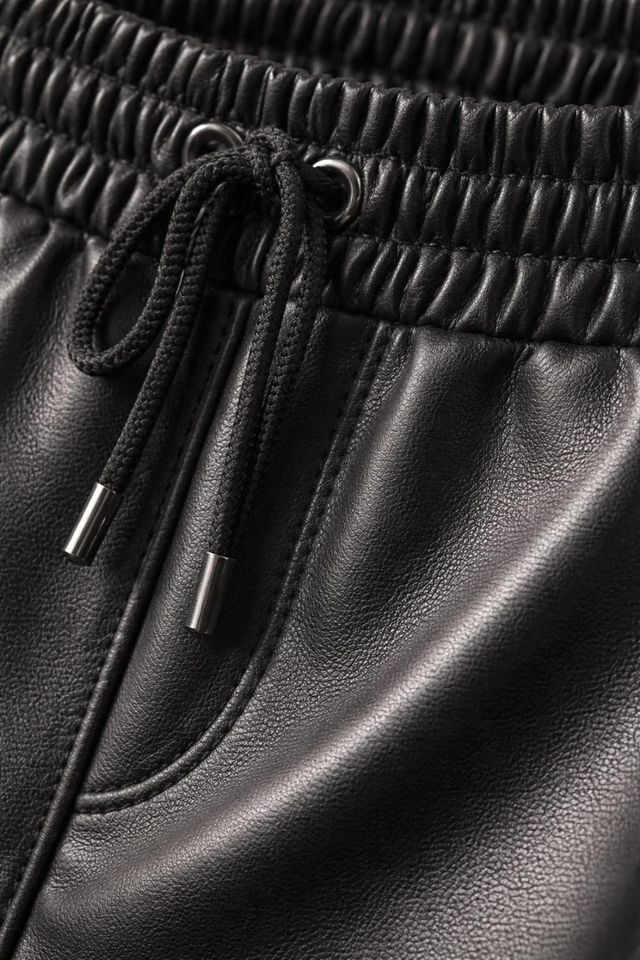 Suni Deri Paçası Lastikli Pantolon Siyah